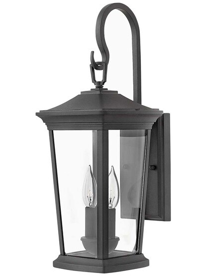 Bromley Small Outdoor Wall-Mount Lantern with Scrolled Arm in Museum Black.